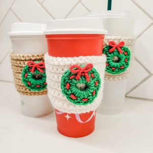 The crochet mini Christmas wreath cozy.