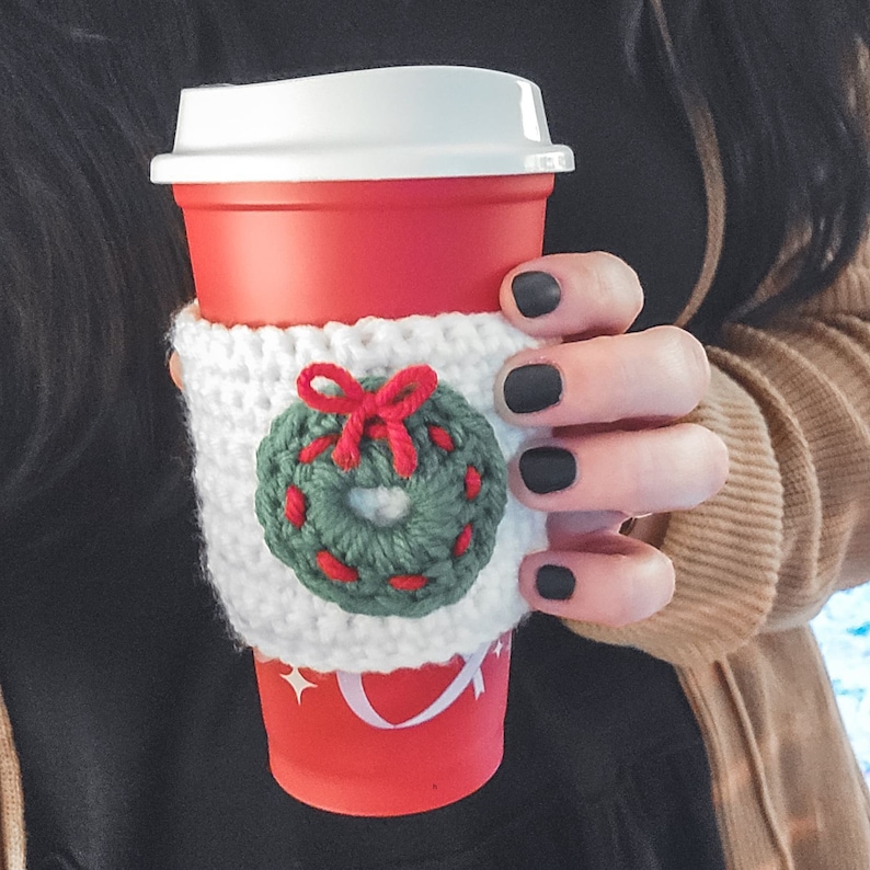 The crochet mini Christmas wreath cozy.