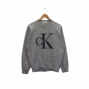 white ck jumper