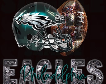 May include: A green and black football helmet with a silver face mask and a brown and gold football with glitter. The helmet has a green and white eagle logo. The text "Philadelphia Eagles" is written in silver glitter letters.