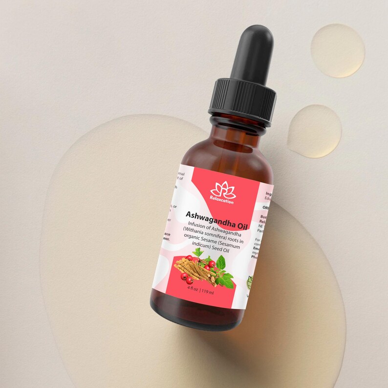 May include: A brown glass bottle with a dropper top, labeled "Relaxcation Ashwagandha Oil". The label is pink and white with a floral design and text describing the oil as an infusion of Ashwagandha roots in organic sesame seed oil. The bottle is 4 fl oz (118 ml).