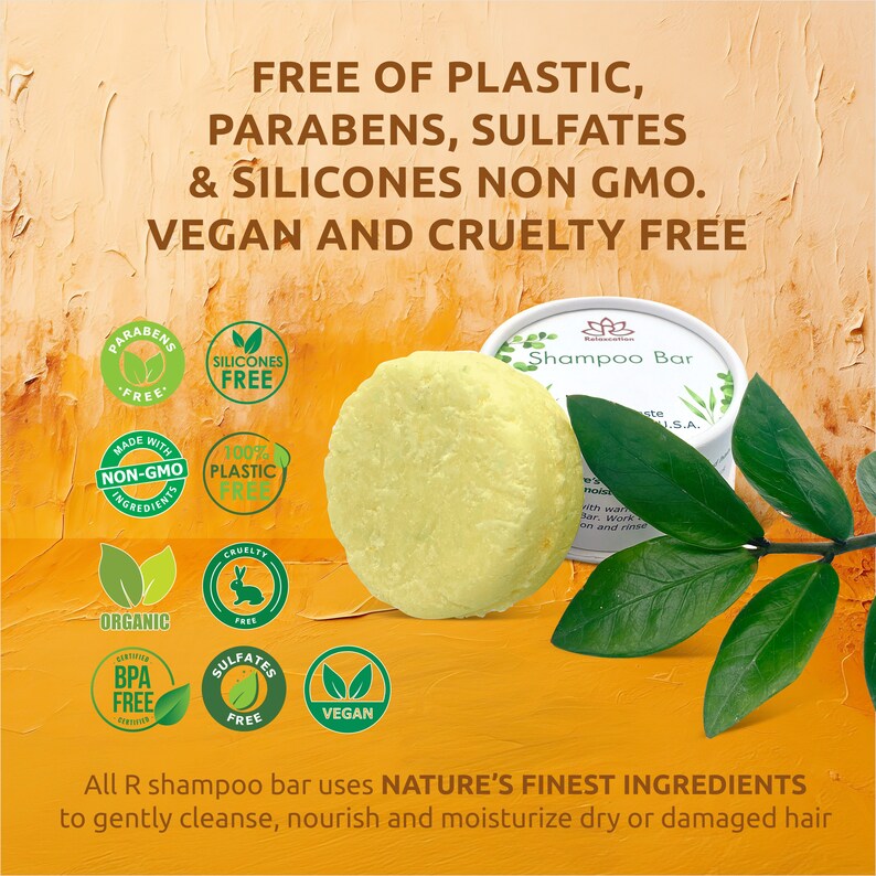 May include: A yellow shampoo bar with the text "Shampoo Bar" on the label. The bar is surrounded by green leaves and various labels indicating it is free of parabens, sulfates, silicones, plastic, GMO, and cruelty-free. The bar is vegan and made with organic ingredients.