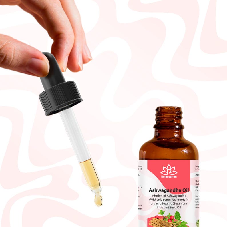 May include: A brown glass bottle with a dropper filled with a light brown liquid. The bottle has a pink label with the text "Relaxcation Ashwagandha Oil Infusion of Ashwagandha (Withania somnifera) roots in organic Sesame (Sesamum indicum) Seed Oil"