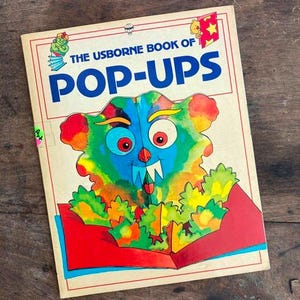 The Usborne Book of Pop-Ups Paperback by Ray Gibson Louisa Somerville Illustrated by Angie Sage
