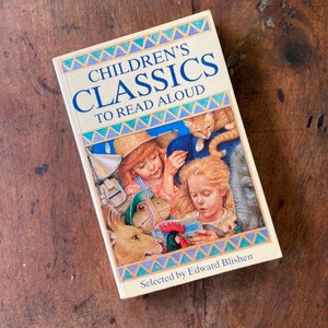 May include: A book titled "Children's Classics To Read Aloud" with a colorful cover featuring illustrations of children reading with animals. The book is selected by Edward Blishen.