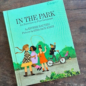 In The Park An Excursion in Four Languages by Esther Hautzig Pictures by Ezra Jack Keats 1968 Hardcover