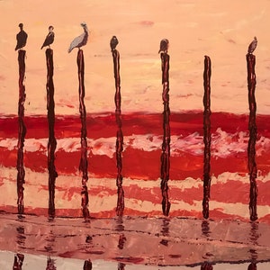 May include: A painting of a red and pink sunset over a body of water with seven dark red poles standing in the water.  Each pole has a bird perched on top.
