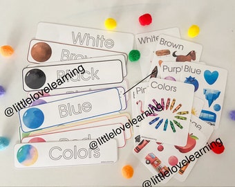 May include: A set of colour recognition cards for children. The cards feature different colours, including white, brown, black, blue, and purple. The cards also include a colour wheel with crayons and a card with a variety of objects in different colours.