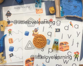 May include: A set of printable alphabet tracing worksheets featuring a pirate theme. The worksheets include letters, numbers, and images of pirates, treasure chests, and flags. The text "@littlelovelearning" appears on the worksheets.