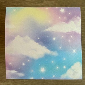 May include: A pastel rainbow sky with white clouds and white stars. The background is a light blue, pink, and yellow gradient.