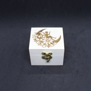Small wooden trinket box with an engraved fairy sitting in a cresent moon design