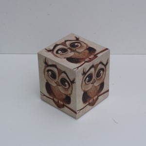 Decoupage moneybox with an owl theme
