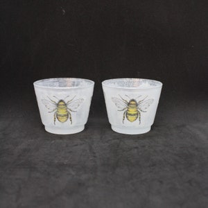 Set of decoupage glass tealight holders with images of Bumble bees