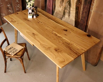 Dining table "Adebar" made of rustic wild oak in modern minimalist style