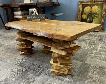 Coffee table "Trequercus" made of wild oak with tree edge and stacked legs