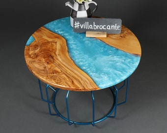 Coffee table "Kaltrina" made of rustic olive wood and epoxy resin in light blue