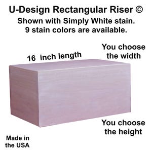 May include: A rectangular wooden riser, 16 inches long, with a light wood stain. The riser is customizable with a choice of width and height. The text "U-Design Rectangular Riser" and "Made in the USA" are visible.