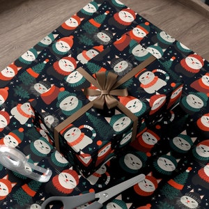 May include: A black and green gift wrap with a repeating pattern of cats wearing Santa hats. The cats are in various poses and have different facial expressions. A brown gift box with a white and red ribbon is on top of the wrapping paper.