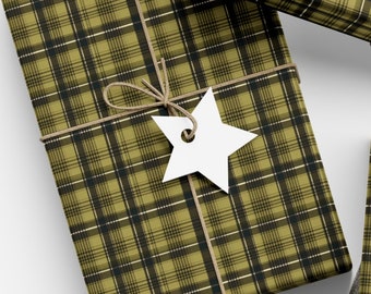 May include: Three gift boxes wrapped in black and yellow plaid wrapping paper with twine and paper tags. The boxes are on a white surface with a spool of twine and a pair of scissors.