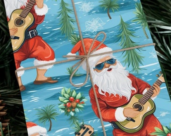 May include: Blue wrapping paper with a repeating pattern of Santa Claus wearing sunglasses and playing a guitar. The background is a blue and white tropical scene with palm trees and snowflakes.