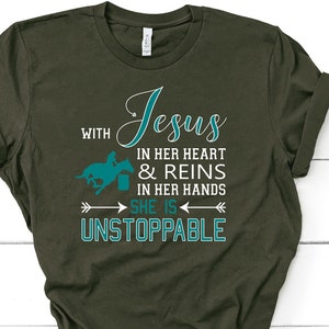 With Jesus In Her Heart & Reins In Her Hands She is Unstoppable Short-Sleeve Unisex T-Shirt, Christian Barrel Racing Shirt, Barrel Racer Tee