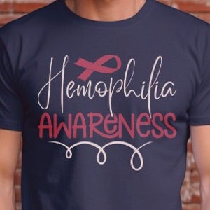 Camiseta unissex com design de conscientização sobre hemofilia, fita vermelha, camiseta lutador, guerreiro, cirurgia, recuperação superior