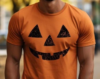 Unisex T-shirt z dyniową twarzą | Koszulka na Halloween | Koszulka Jack-o'-Lantern | Moda jesienna, Koszulka unisex, Zabawna koszulka Jack O Lantern na Halloween