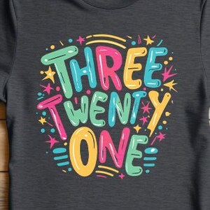 May include: A dark gray t-shirt with a colorful graphic that says "THREE TWENTY ONE" in a playful font.