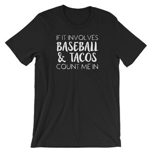 May include: Black t-shirt with white text that reads "If it involves baseball & tacos count me in."