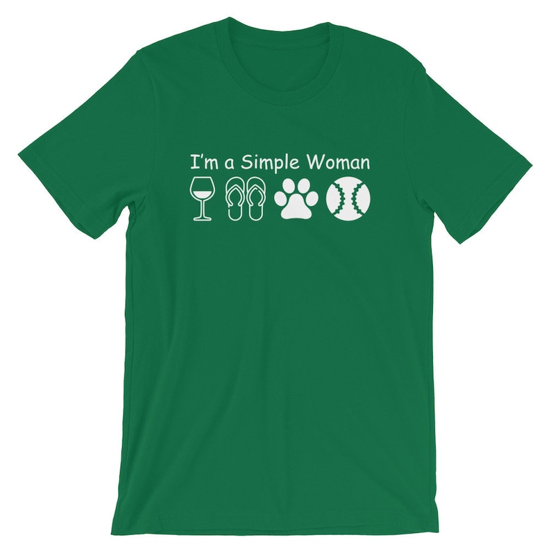 May include: Green short-sleeved t-shirt with white text that reads "I'm a Simple Woman" and four white icons: a wine glass, flip-flops, a paw print, and a baseball.