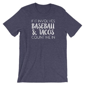 May include: A navy blue t-shirt with white text that reads "If it involves baseball & tacos count me in."