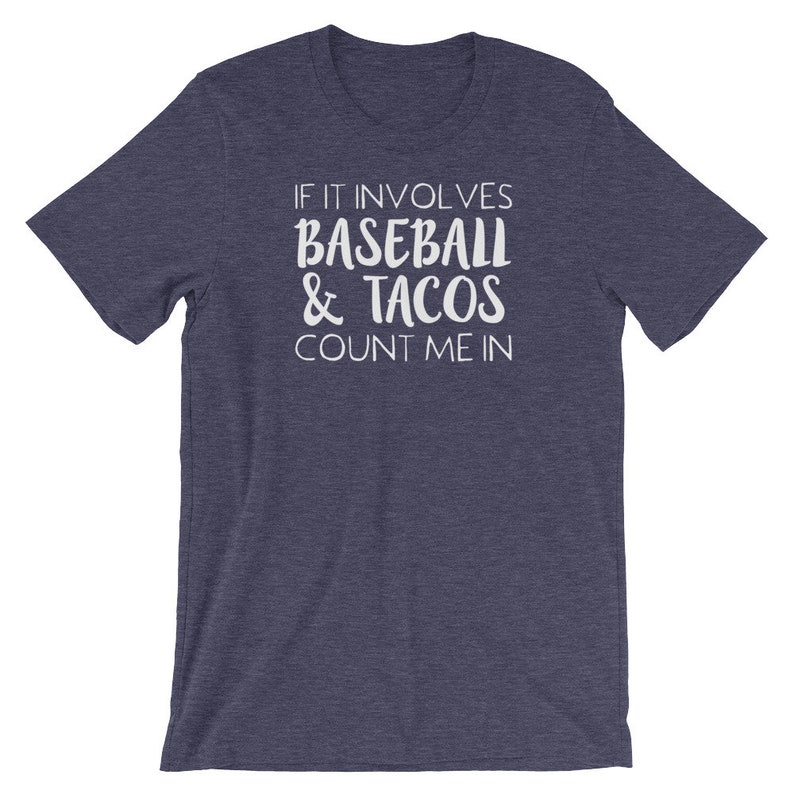 May include: A navy blue t-shirt with white text that reads "If it involves baseball & tacos count me in."