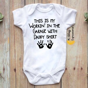 Bodysuits by M. Ekhoff Collection This is my working in the garage with daddy shirt cute baby new dad gift baby shower gift infant kids