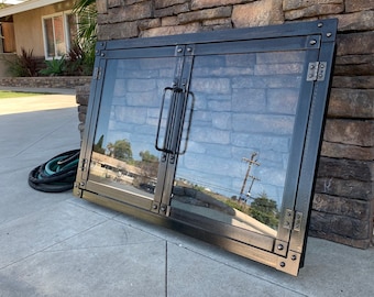 Hand made iron fireplace doors custom made to fit your fireplace custom made design for ryan morici double door design