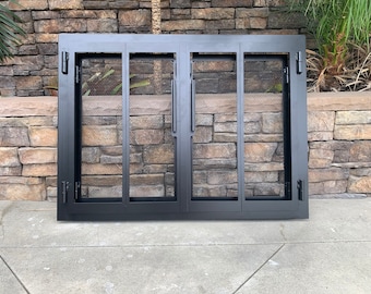Hand made iron fireplace doors