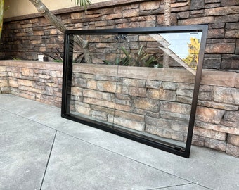 Frameless double fireplace door