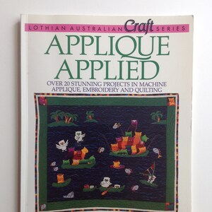 May include: A book titled "APPLIQUE APPLIED" from the Lothian Australian Craft Series. The cover features a colourful applique design with boats, owls, and other elements. The book promises over 20 stunning projects in machine applique, embroidery, and quilting.