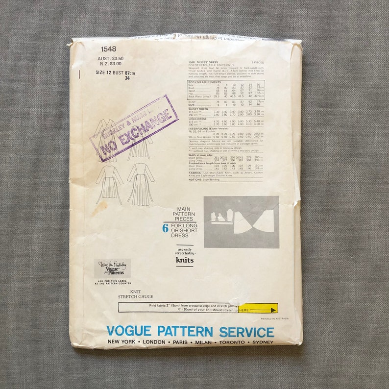 May include: A vintage Vogue sewing pattern for a dress, with a size 12 bust measurement of 34 inches. The pattern is for a long or short dress and is made for knit fabrics. The pattern is labeled "1548" and has a stamp that says "No Exchange".