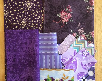 Scrap bag of quilting cottons - purple and mauve colours - 95 g assorted sizes