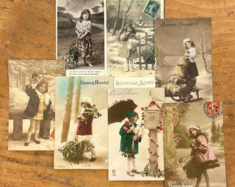 French antique Happy New Year greetings postcards with pretty young girls from early 1900s
