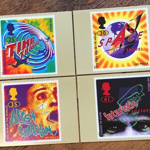 May include: Four colourful postage stamps featuring illustrations from H.G. Wells' science fiction novels. The stamps depict scenes from "The Time Machine", "The First Men in the Moon", "The War of the Worlds", and "Things to Come".