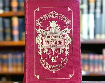 Vintage red French book for display from the Hachette Bibliotheque Rose Library, Memoires d’un Petit Garçon is illustrated and dated 1898