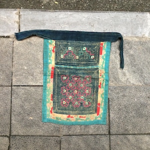 Vintage tribal Hmong batik baby carrier in the north of Vietnam