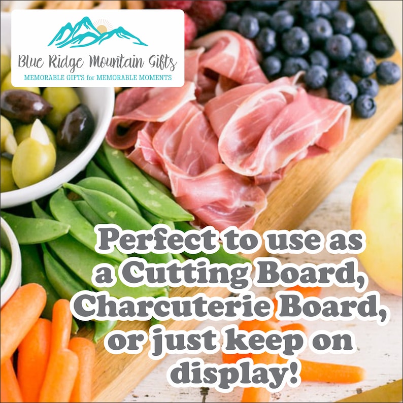 May include: A wooden serving board with a variety of food items, including olives, green beans, carrots, prosciutto, blueberries, and strawberries. The board is perfect for serving a charcuterie board or as a cutting board. The text "Perfect to use as a Cutting Board, Charcuterie Board, or just keep on display!" is printed on the board.