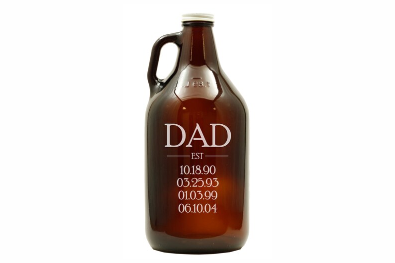 May include: A brown glass growler with a white inscription that reads "DAD EST 10.18.90 03.25.93 01.03.99 06.10.04".