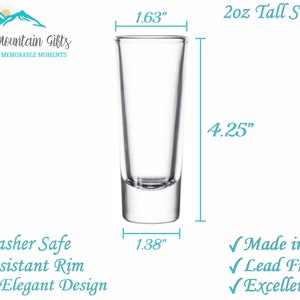 May include: A clear glass shot glass, 2 ounces in size, is shown with measurements in inches. The glass is 4.25 inches tall, 1.63 inches wide at the top, and 1.38 inches wide at the base. The text "2oz Tall Shot Glass" is written above the glass. The text "Blue Ridge Mountain Gifts" is written at the top of the image. The text "MEMORABLE GIFTS for MEMORABLE MOMENTS" is written below the company name. The text "Dishwasher Safe", "Chip-resistant Rim", and "Simple, Elegant Design" is written below the glass. The text "Made in America", "Lead Free", and "Excellent Clarity" is written to the right of the glass.