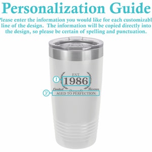 May include: White stainless steel tumbler with a black and white design that says "EST. 1986 Limited Reserve AGED TO PERFECTION".