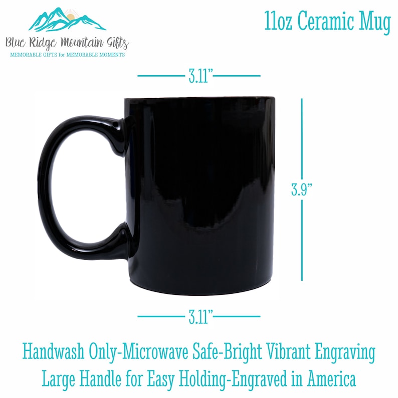 May include: Black 11oz ceramic mug with a large handle. The mug is 3.9 inches tall and 3.11 inches wide. The text on the mug reads "Handwash Only-Microwave Safe-Bright Vibrant Engraving Large Handle for Easy Holding-Engraved in America."