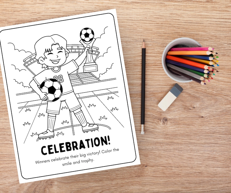 May include: Black and white soccer-themed coloring page with a cartoon illustration of a soccer player holding a soccer ball and a trophy. The word "CELEBRATION!" is at the bottom, with instructions to color the smile and trophy. A pencil, eraser, and colored pencils are on a wooden surface.