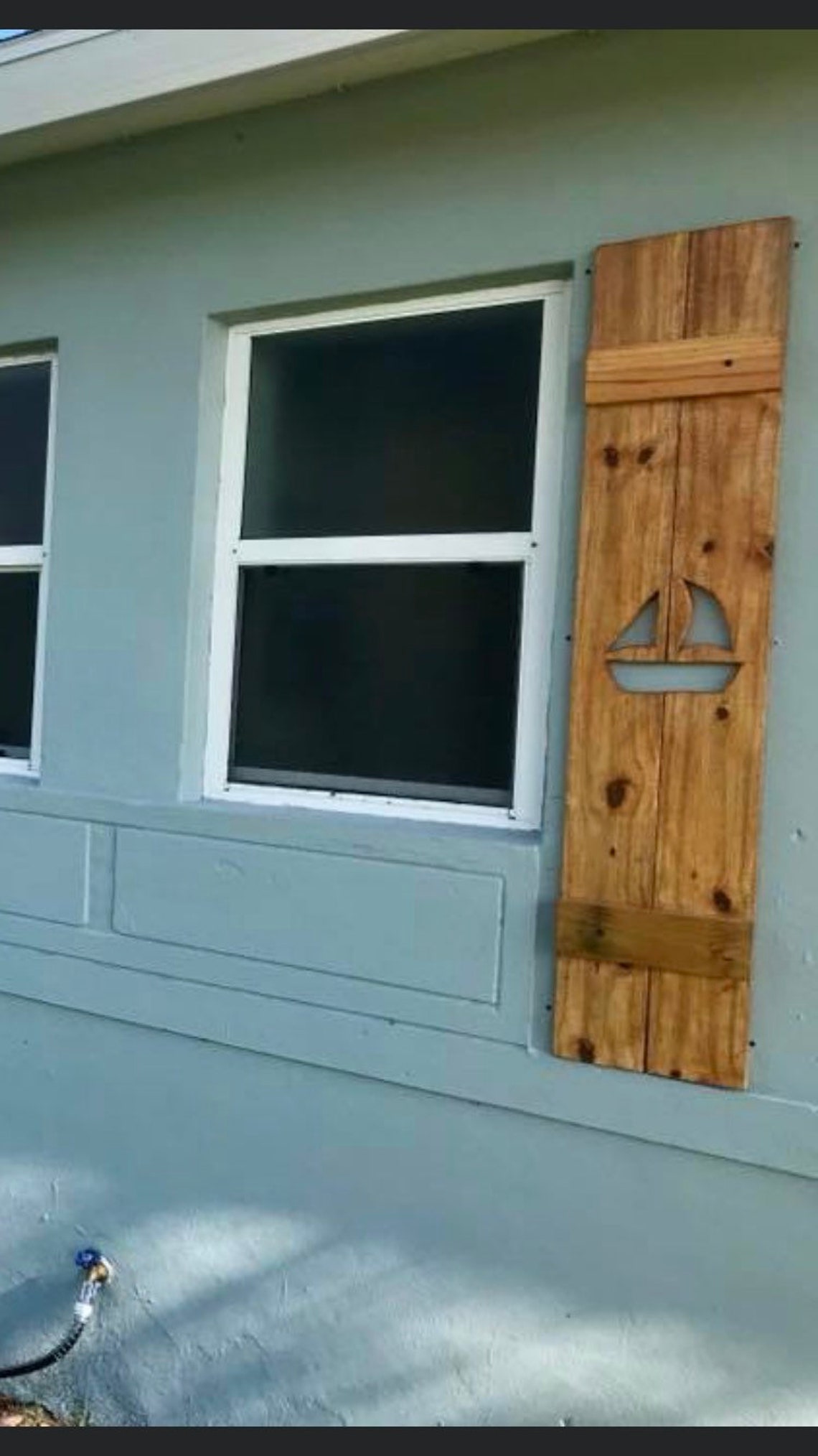 Solid wood exterior decorative window shutters with sail Solid wood exterior decorative window shutters with sail